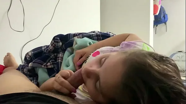 My little stepdaughter plays with my cock in her mouth while we watch a movie (She doesn't know I recorded it الكبير أفضل مقاطع